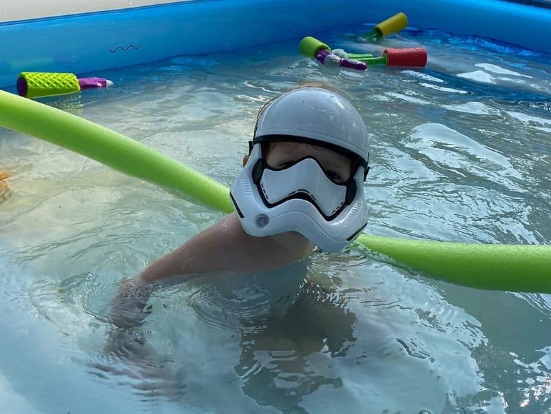 The Morgans recently bought a small inflatable pool – and a foam noodle – to give Beckham swimming lessons. (Photo courtesy of Tyler Morgan) 